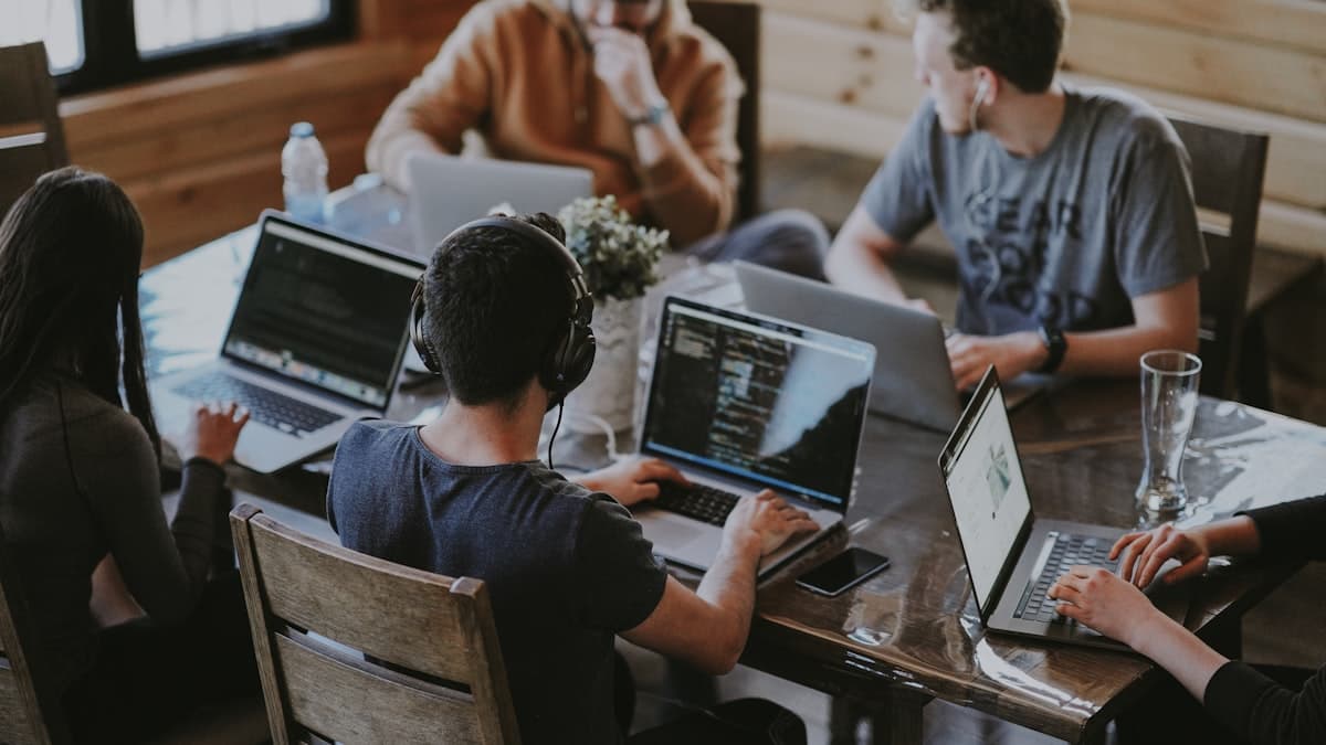 Team collaborating around a conference table in a modern office